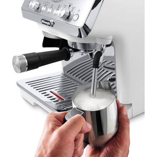De'Longhi La Specialista Arte EC9155.W Bean to Cup Coffee Machine - White - Person using hot milk shot